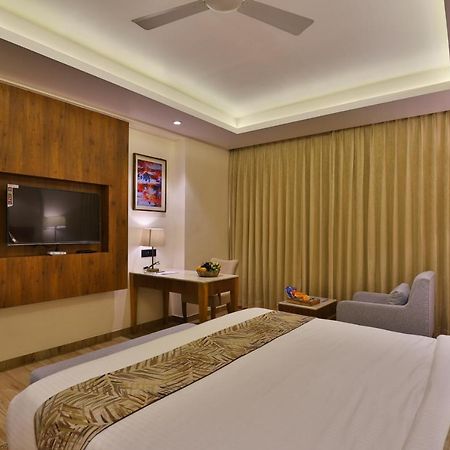 The Square Somnath Hotel Exterior photo